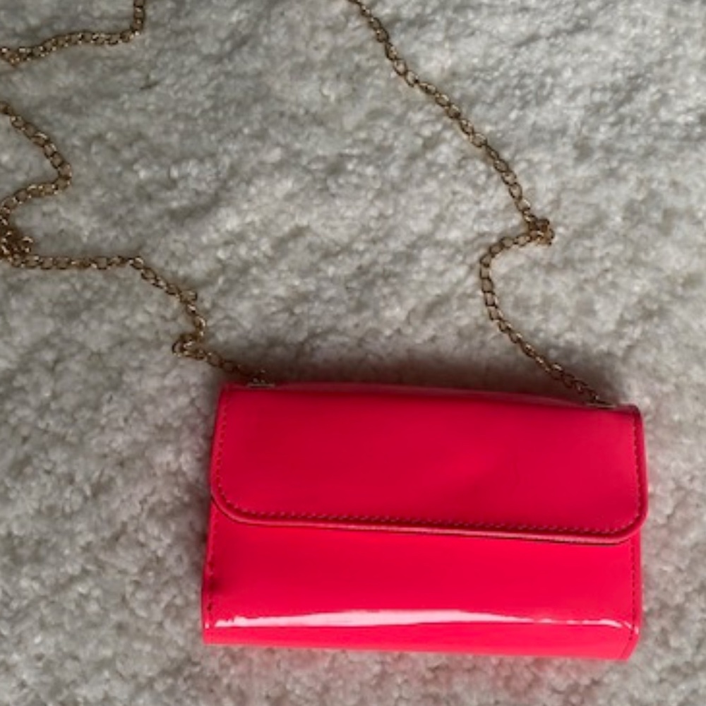 Hot pink faux patent leather crossbody bag